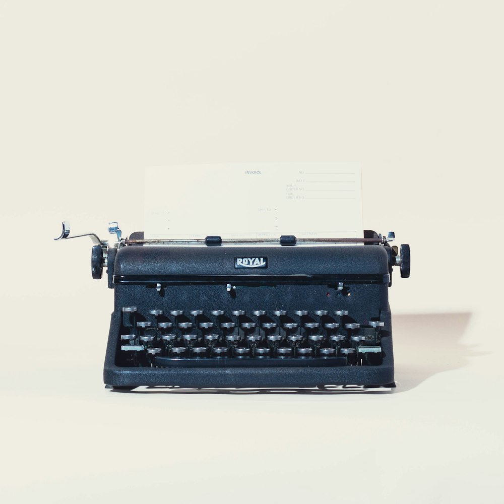 an old typewriter with a piece of paper on top of it