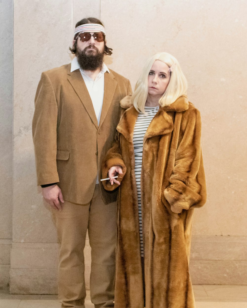 a man and a woman dressed in costume