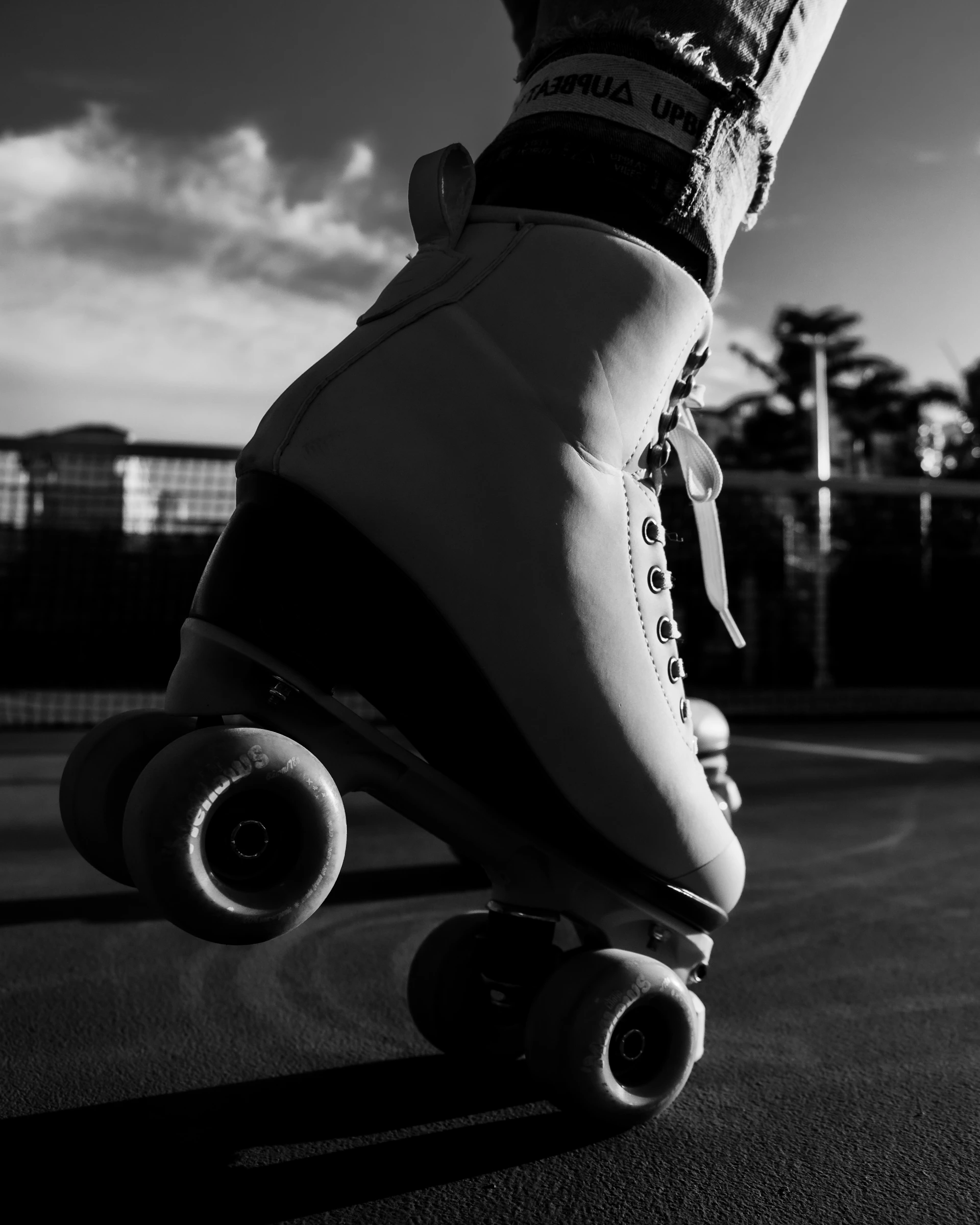 a person riding a skateboard down a street