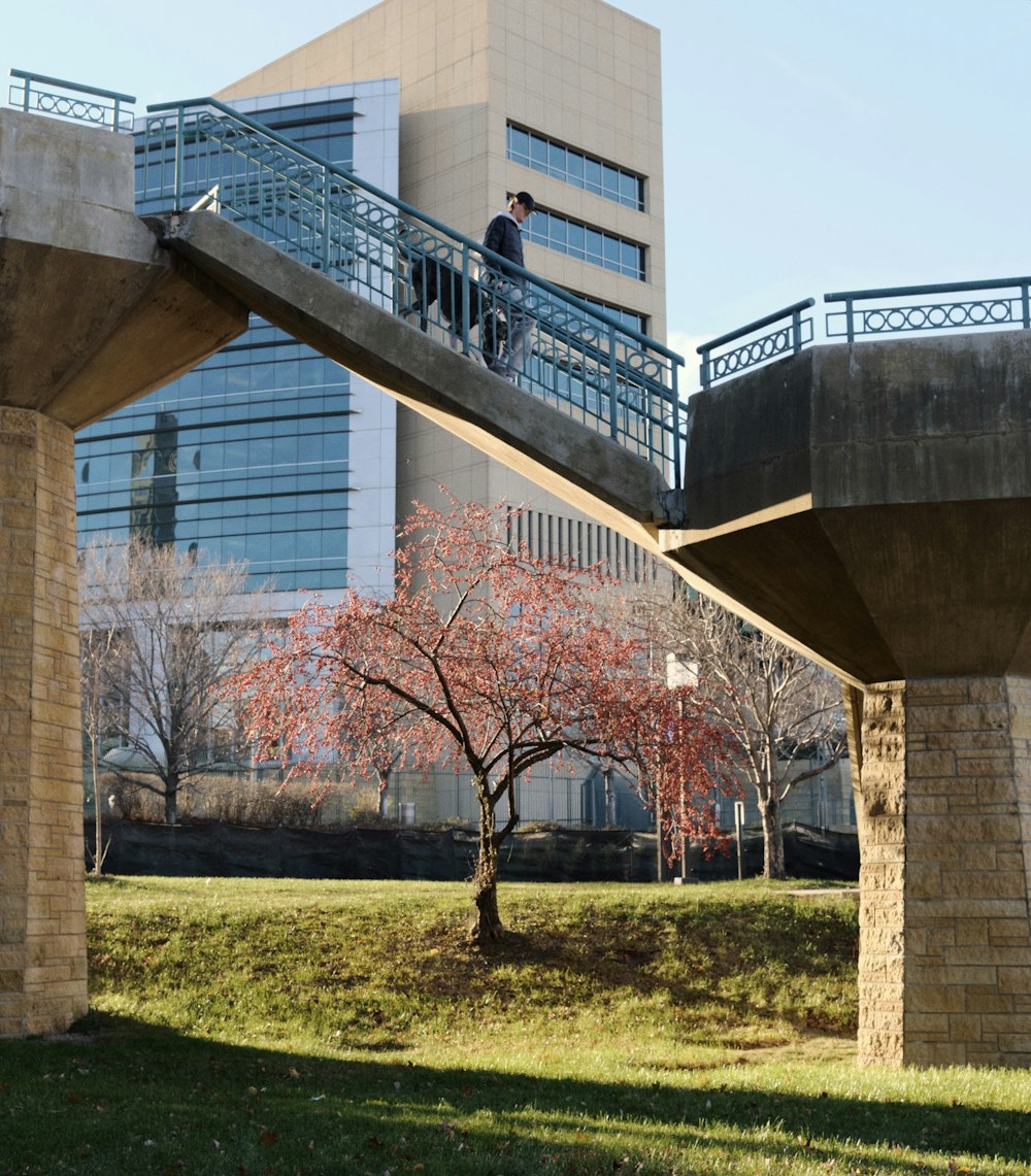 a bridge with a building in the background