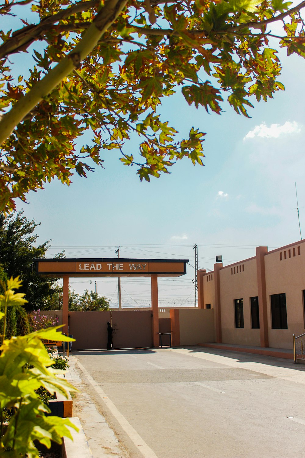 the entrance to a building with a sign above it