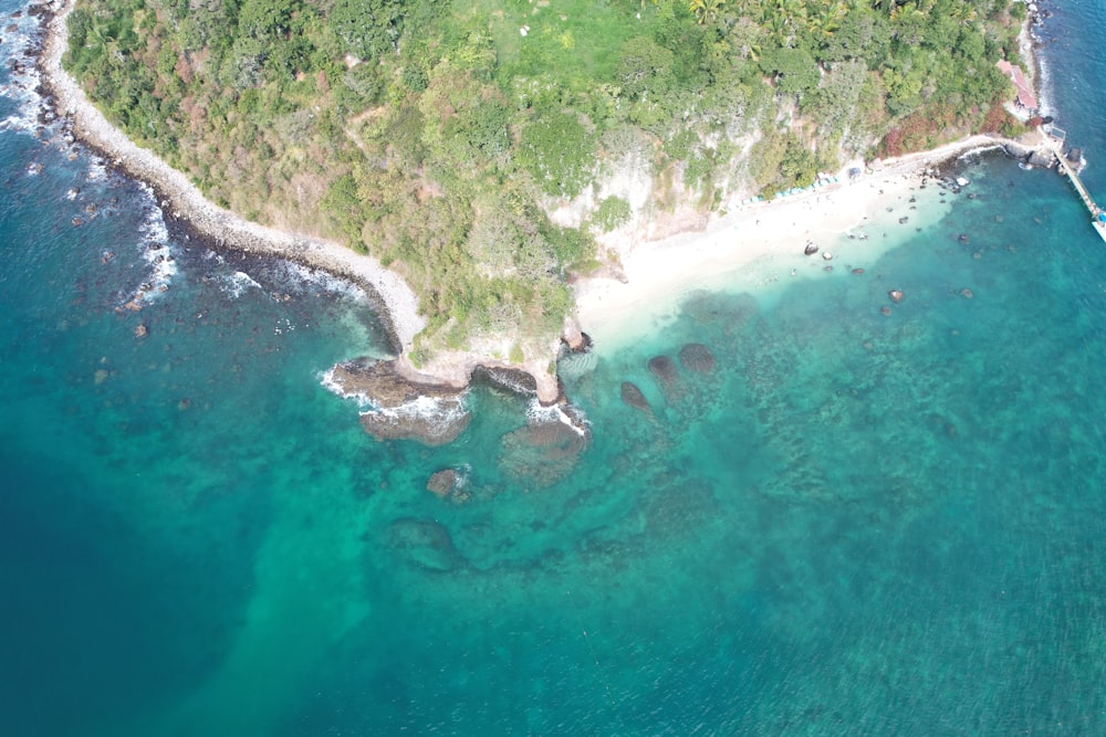 an aerial view of an island in the middle of the ocean