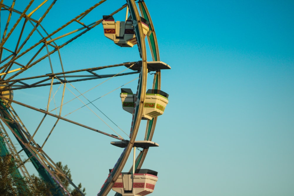 a ferris wheel with a blue sky in the background