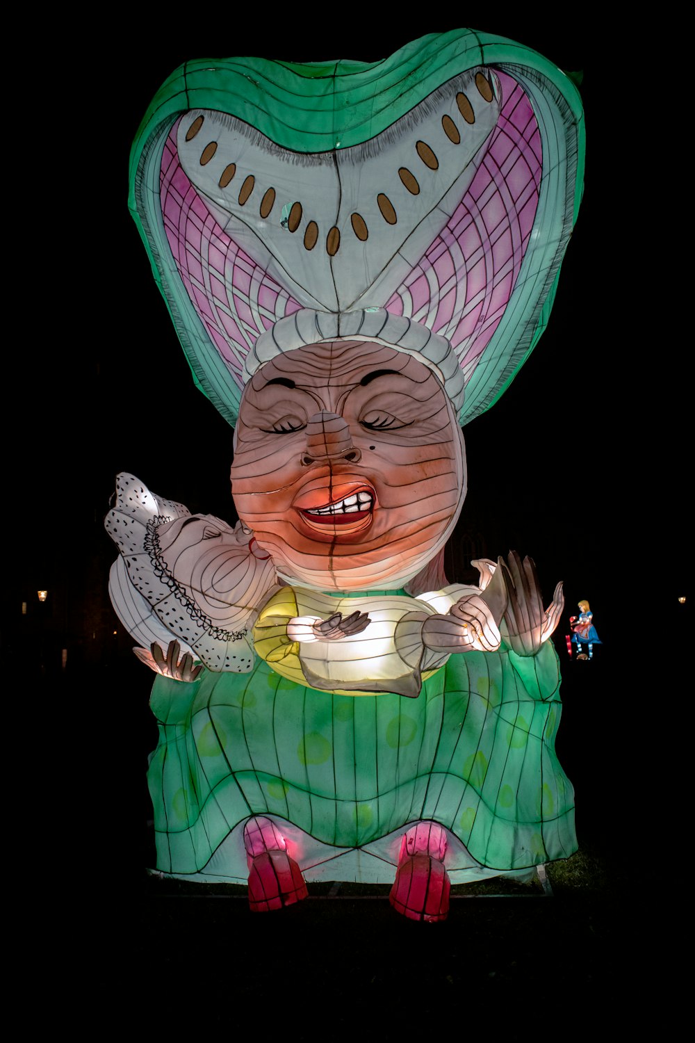 a large float of a person holding a bowl of food