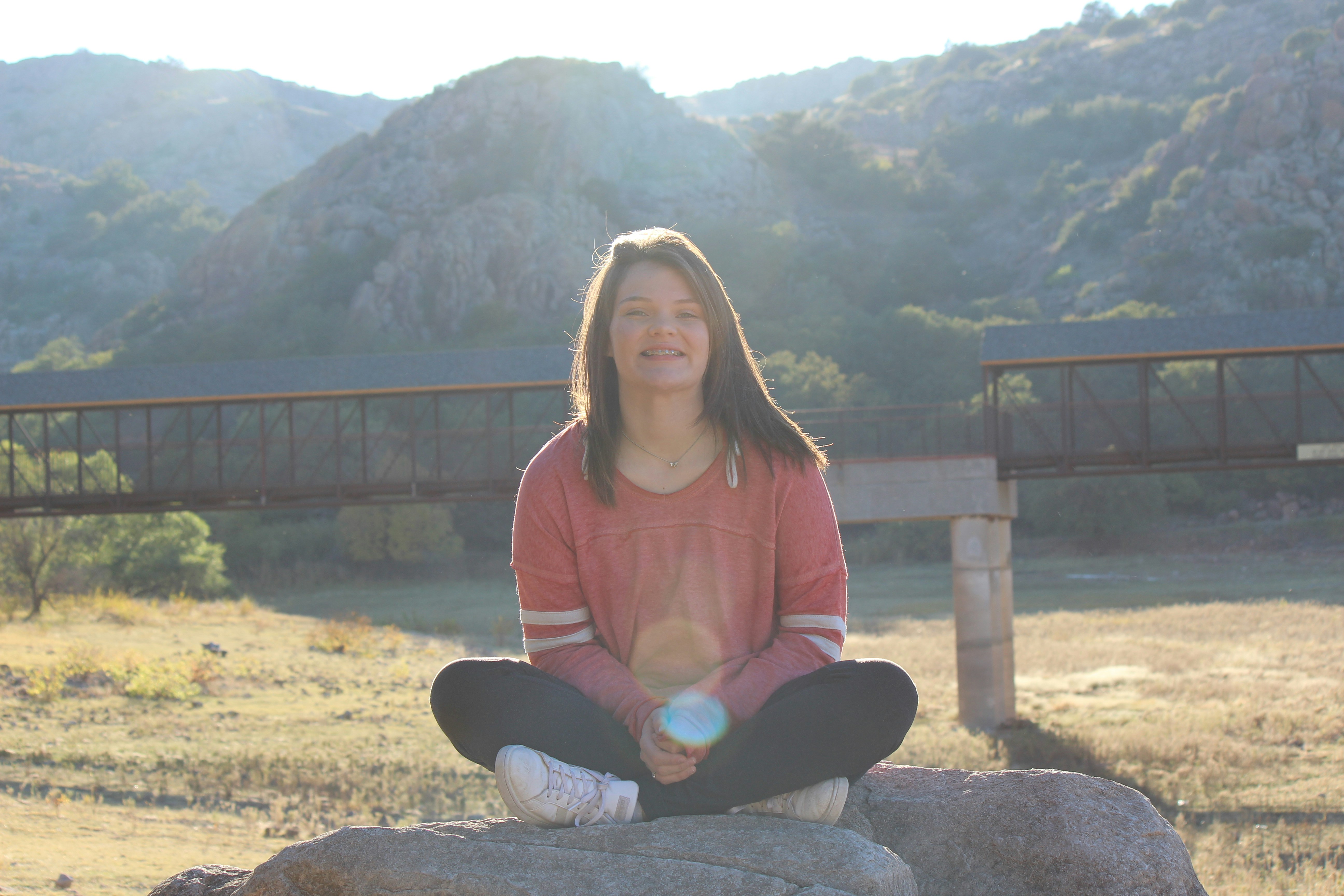 A happy, revitalized person post-IV therapy, enjoying the Boulder scenery - Boulder intravenous therapy