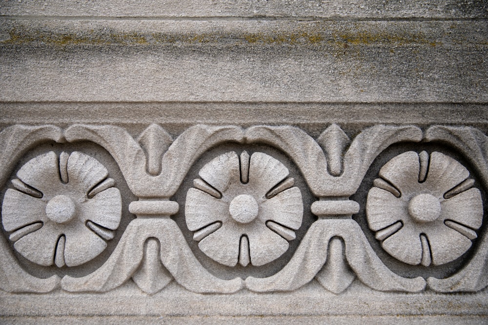 a close up of a decorative design on a wall