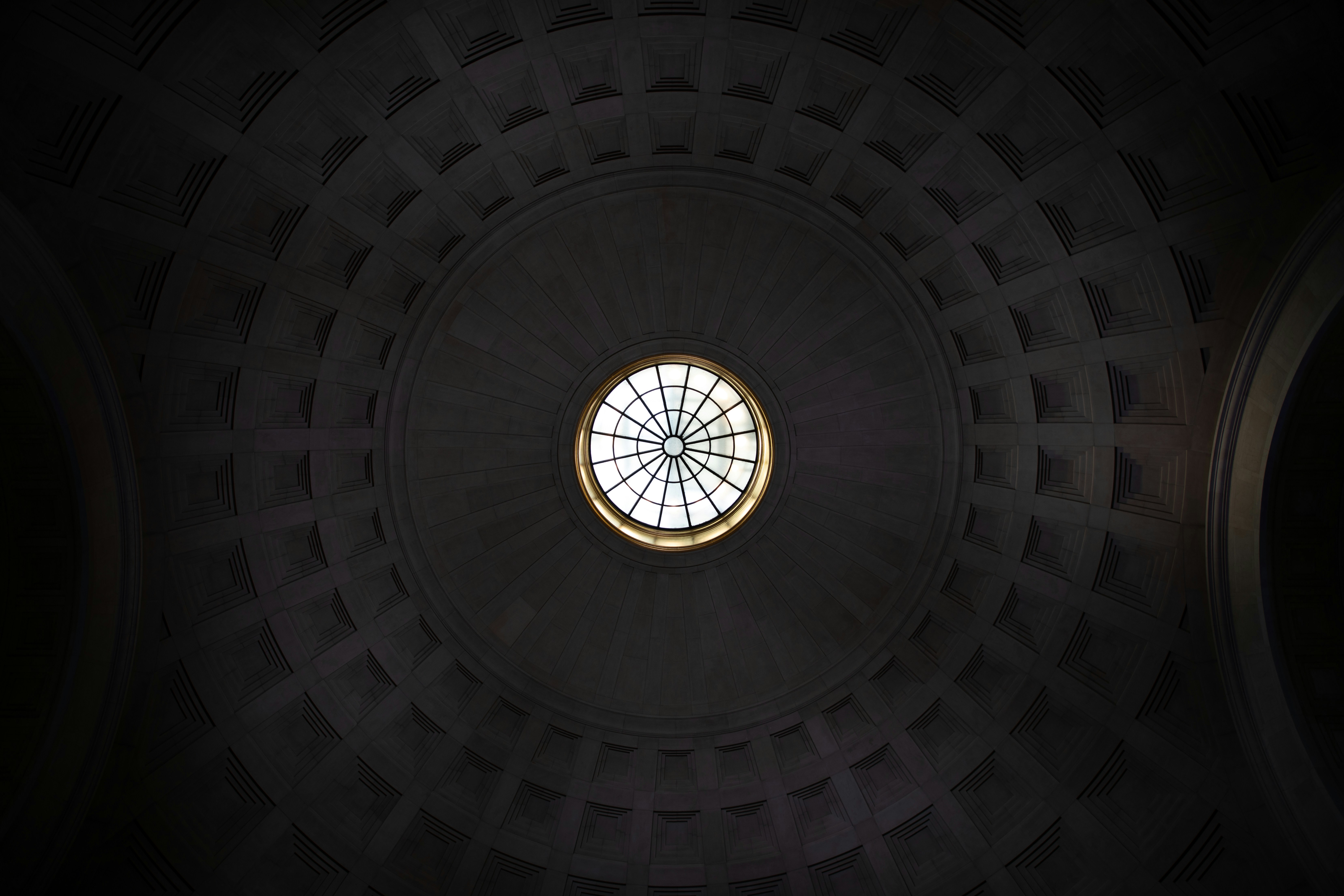 a circular window in the ceiling of a building