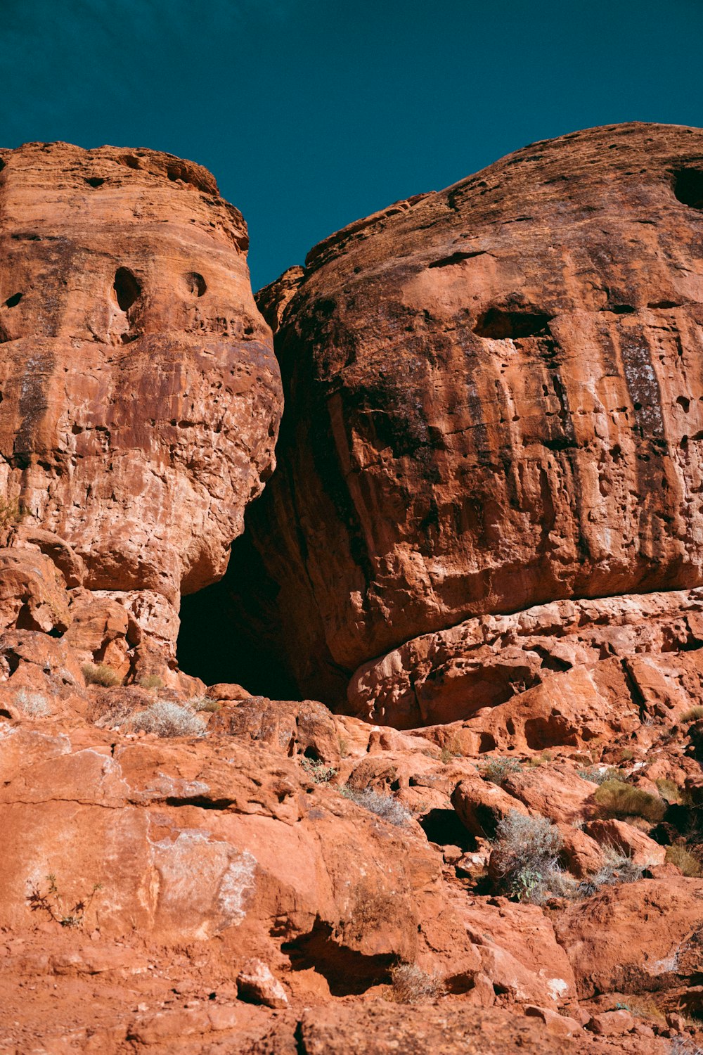 a couple of large rocks sitting next to each other