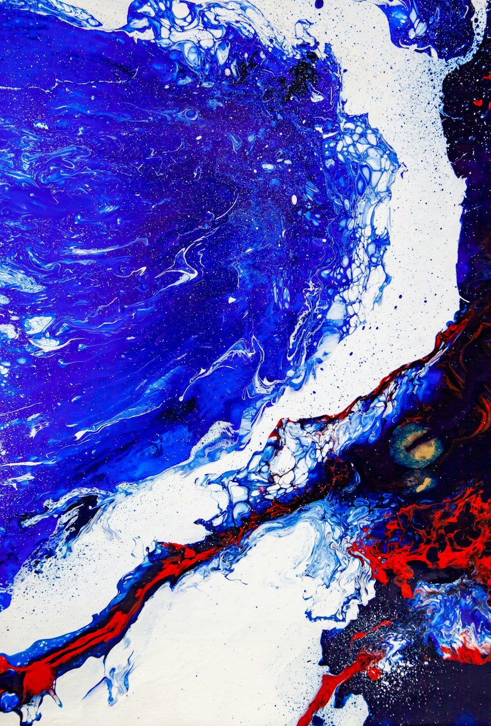 a blue and red abstract painting on a white background
