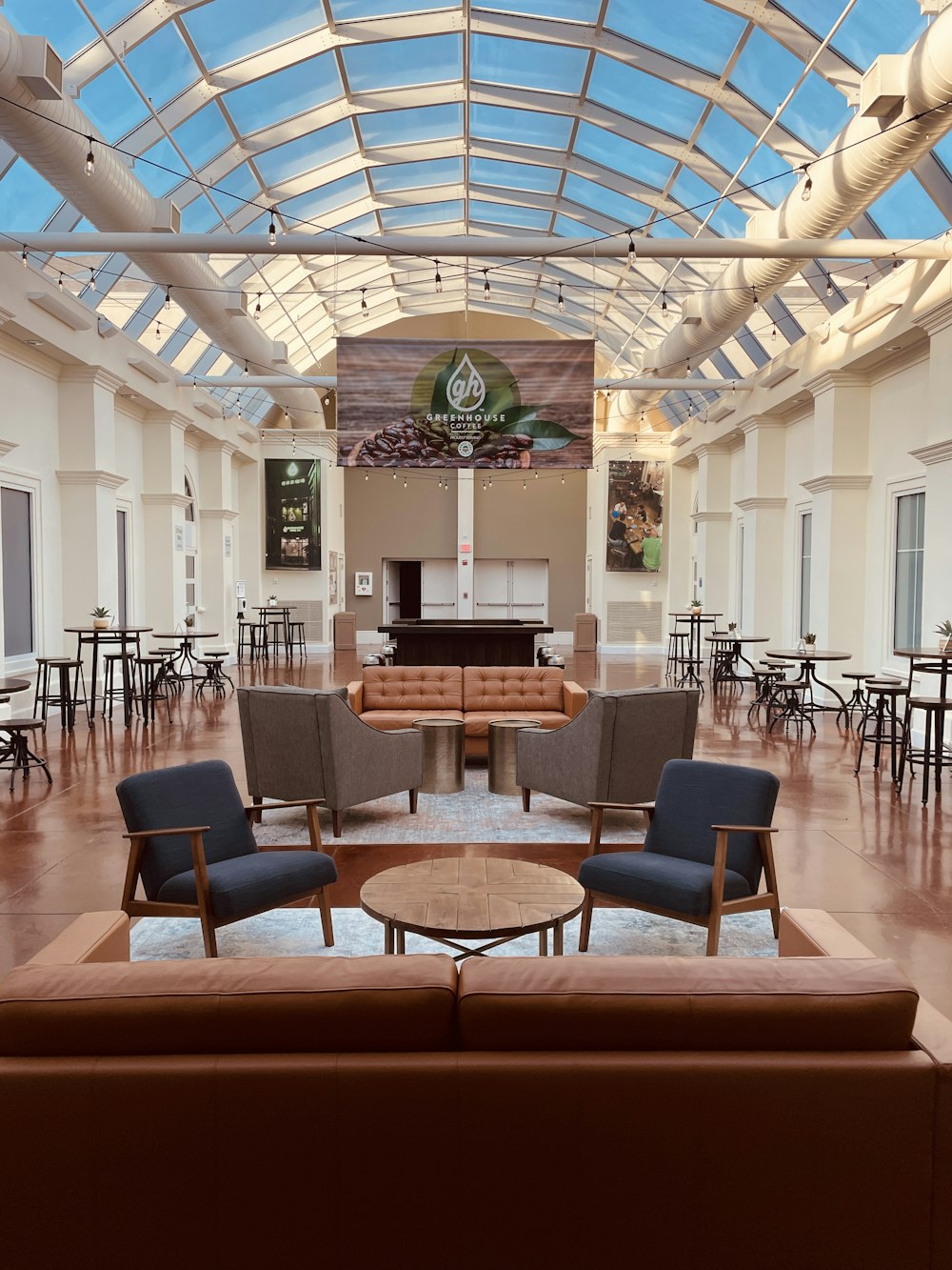 a large room with several chairs and tables