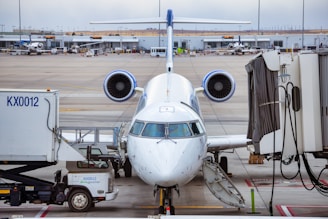 a large jetliner sitting on top of an airport tarmac