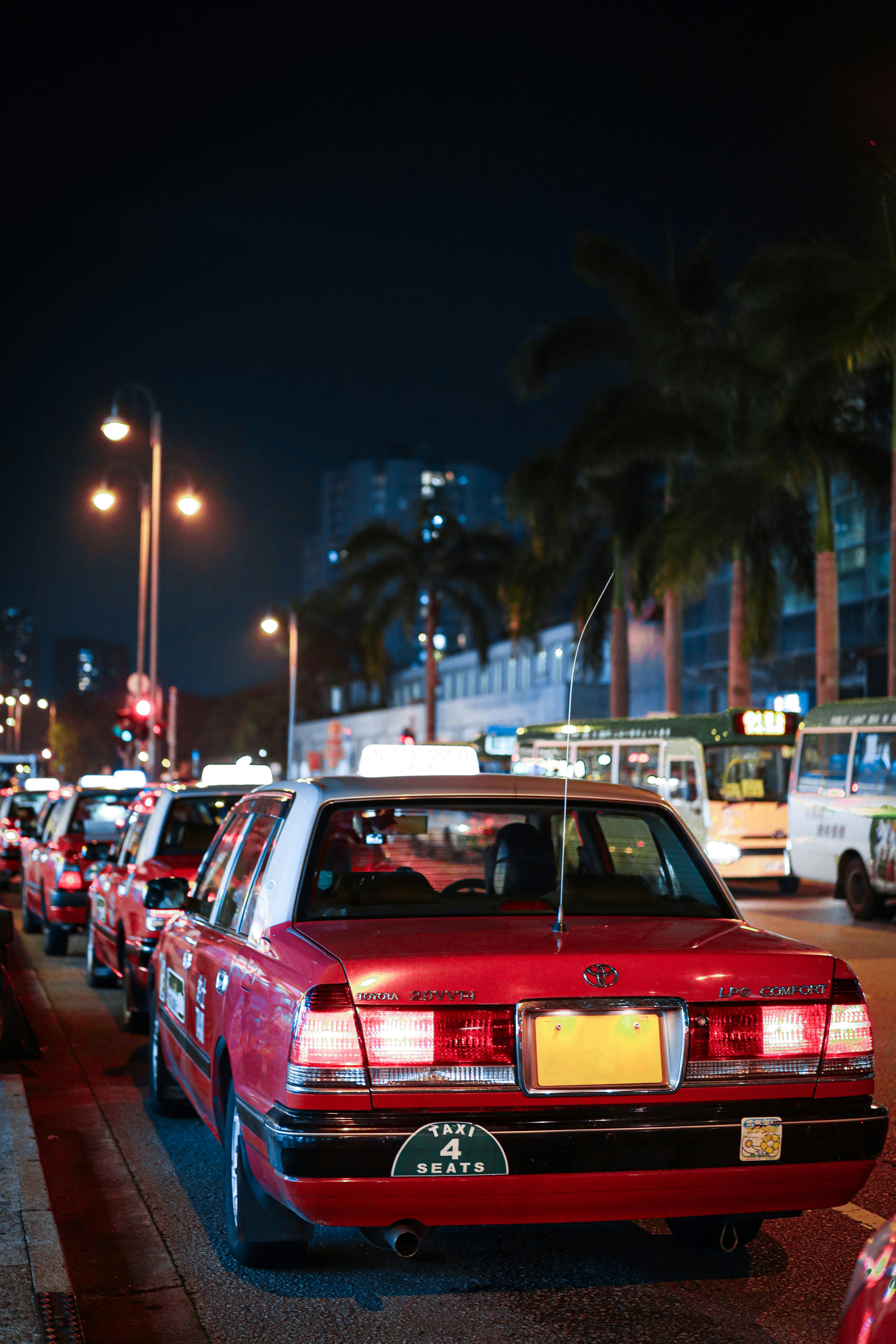 a row of parked cars on a city street