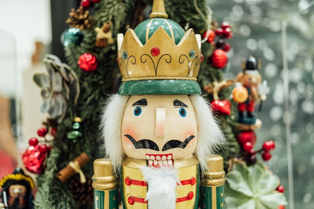 a nutcracker with a crown on top of it