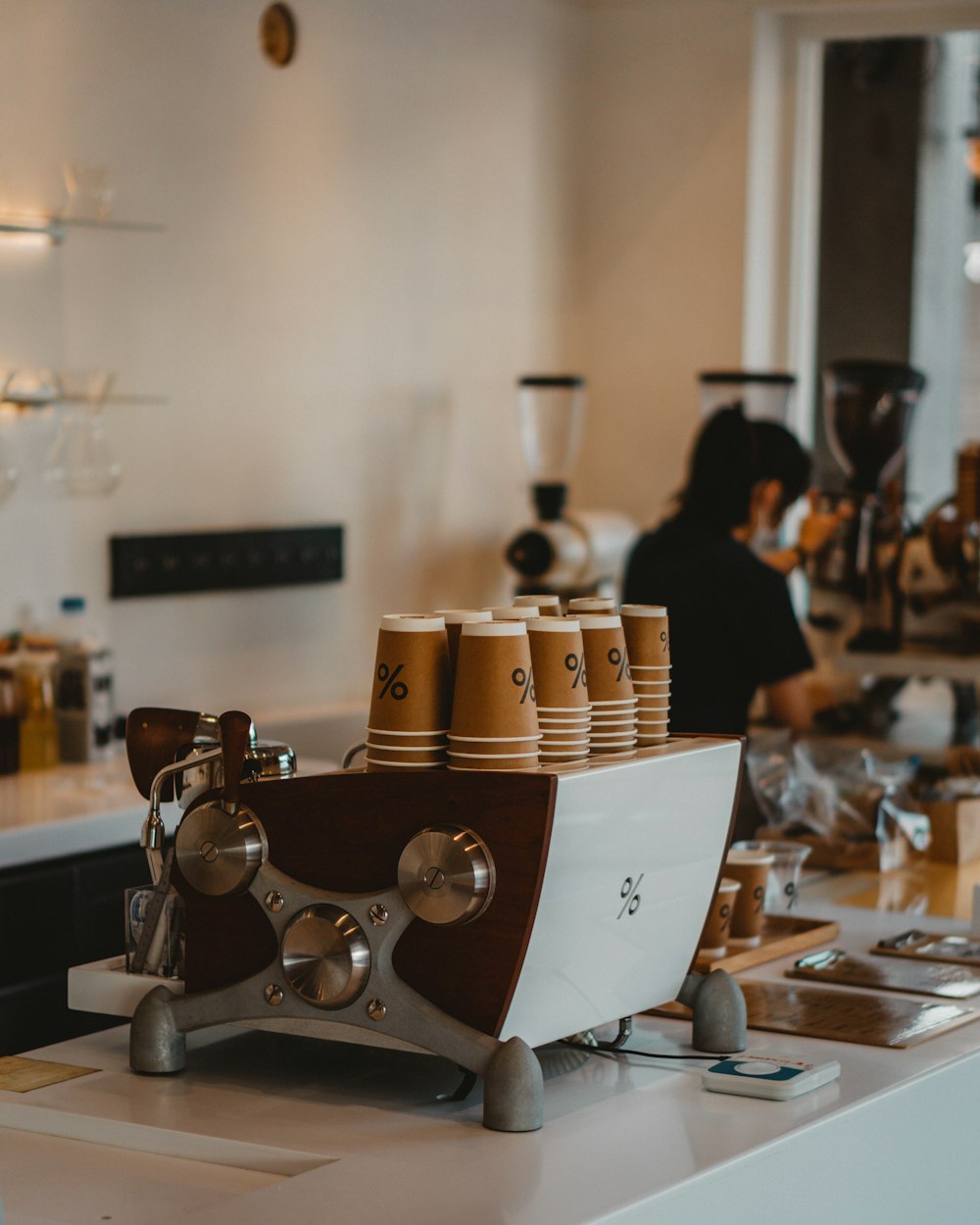 a coffee machine sitting on top of a counter