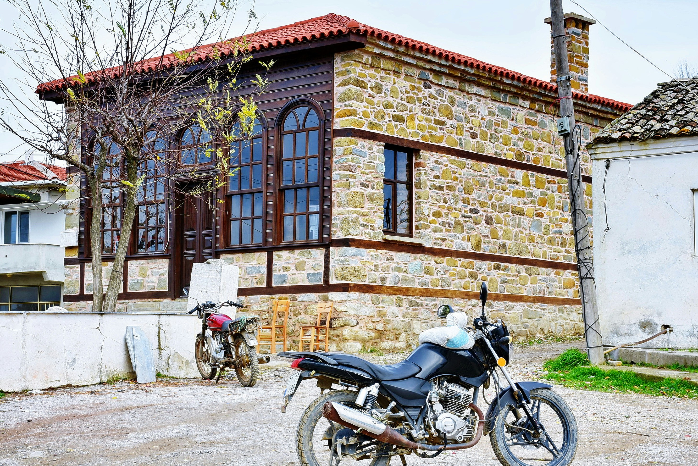 a motorcycle parked in front of a building