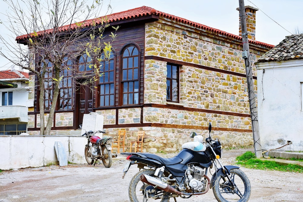 a motorcycle parked in front of a building