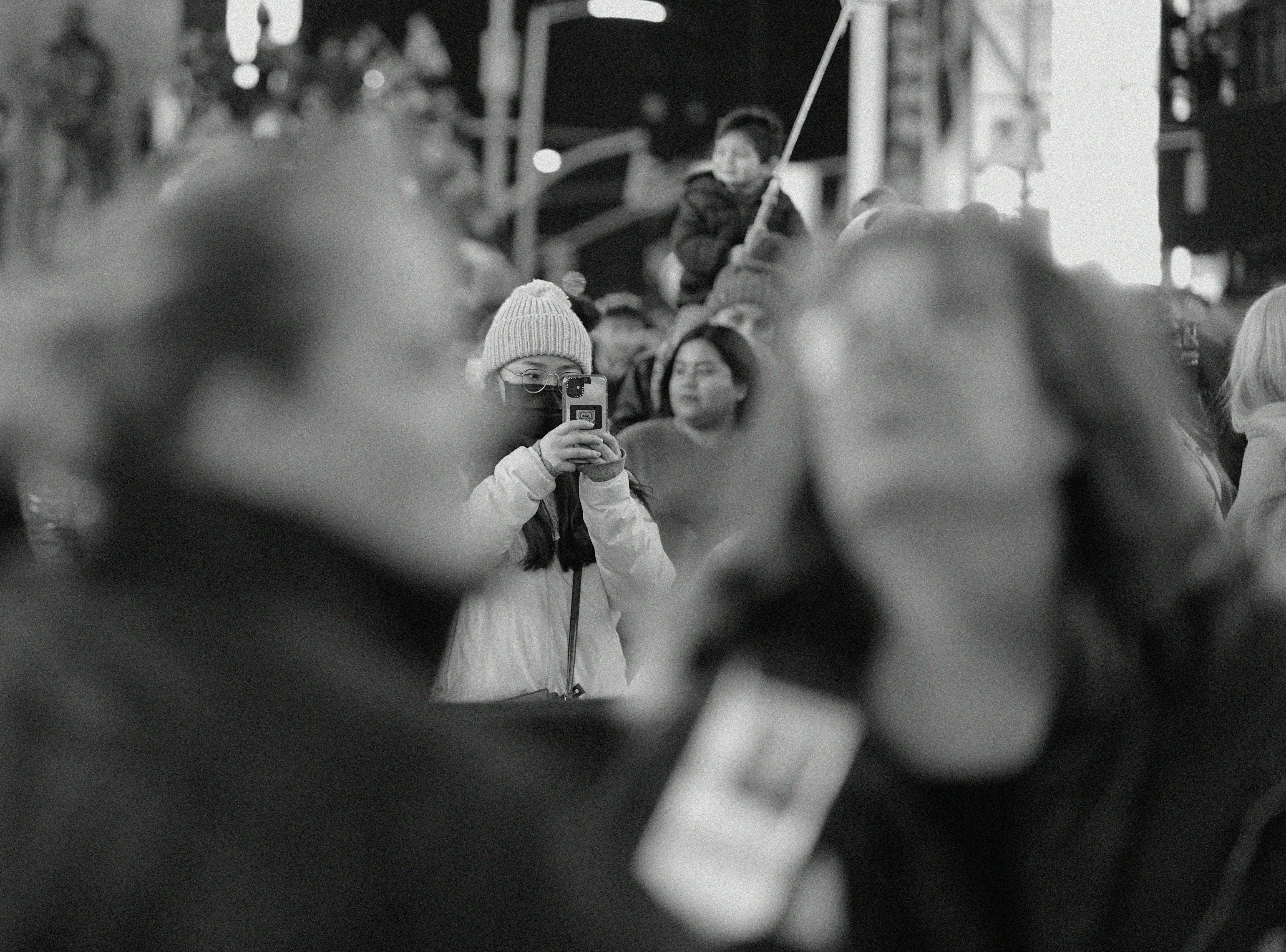 a black and white photo of a crowd of people