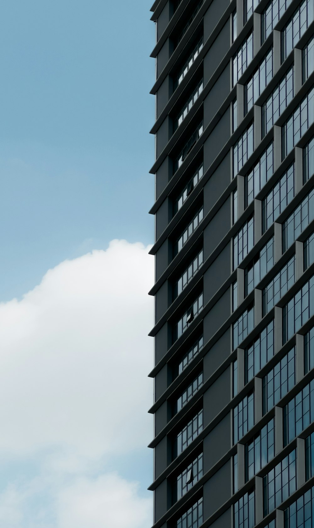 a tall building with a clock on the side of it