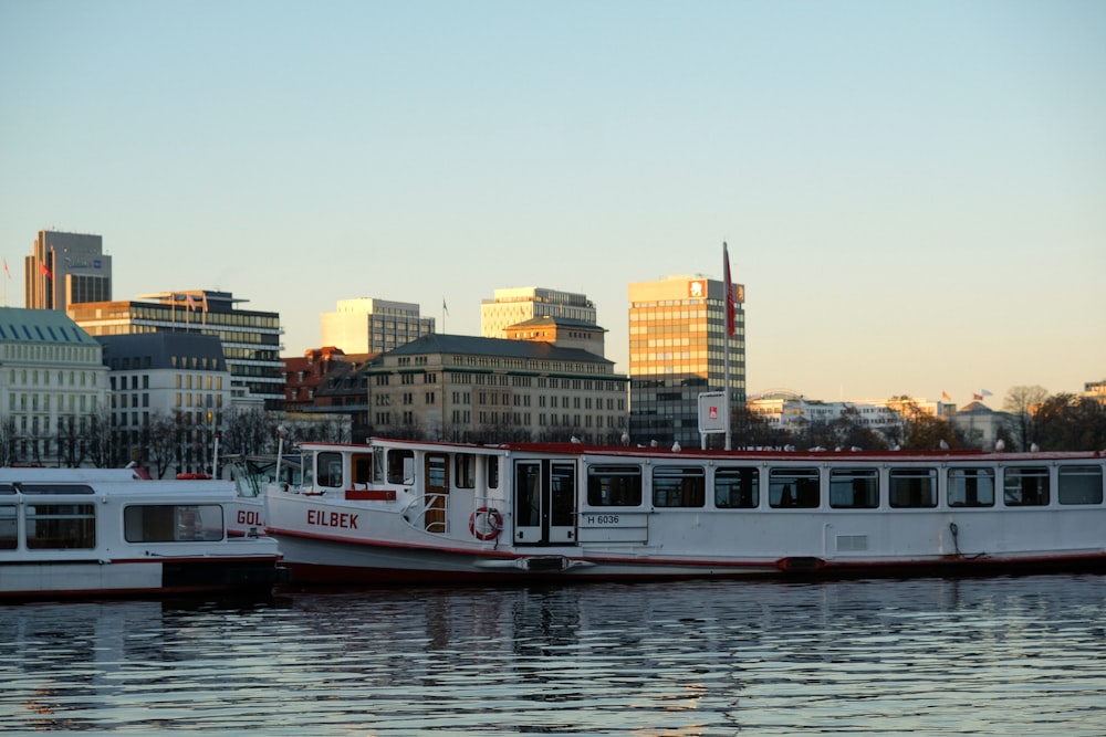 a large white boat floating on top of a body of water