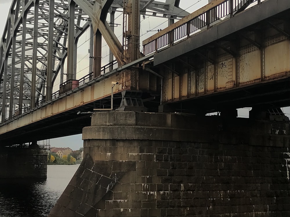 a bridge that has a train going over it