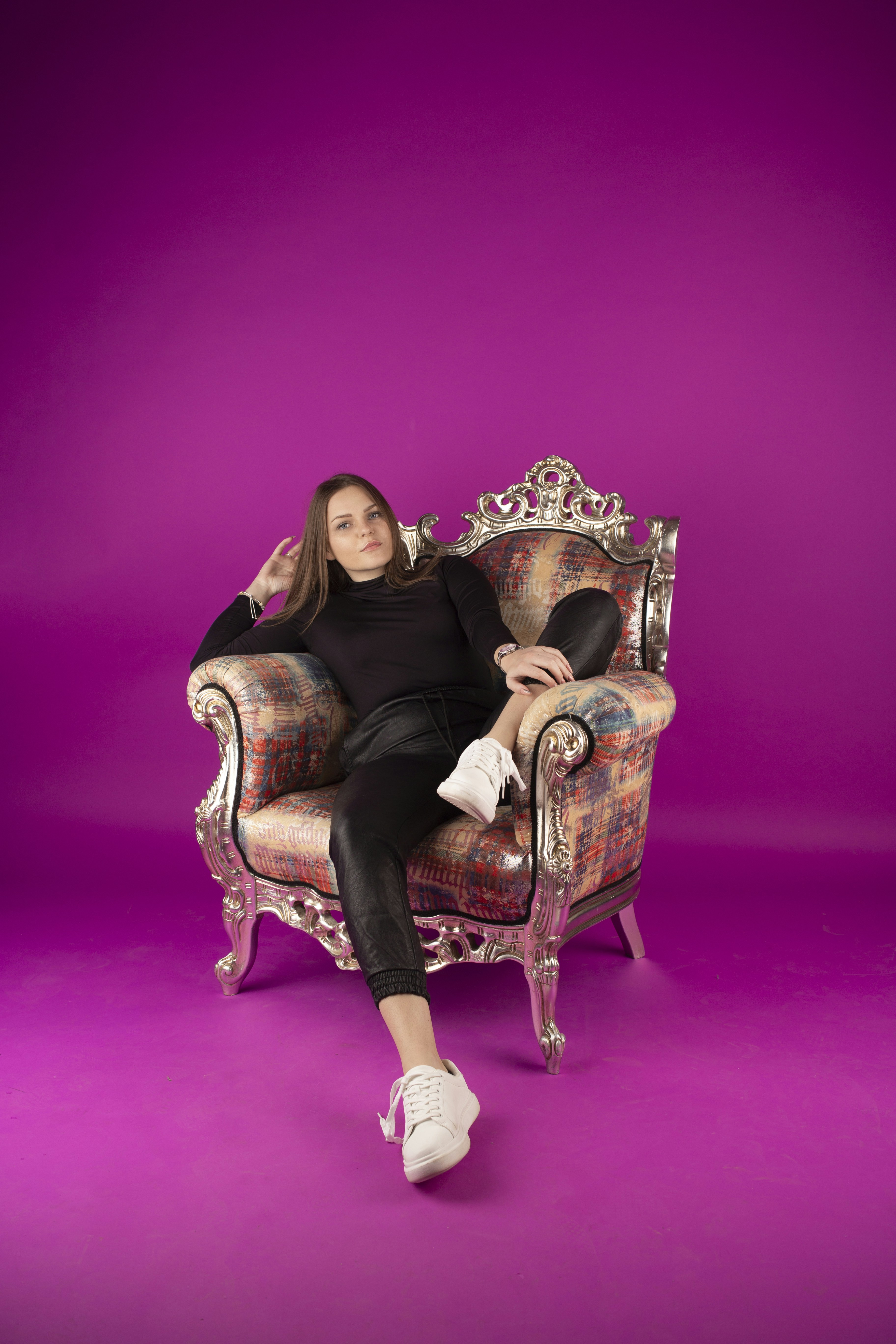 great photo recipe,how to photograph ig: pgh_foto; a woman sitting on a chair with a purple background