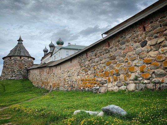 The monastery’s boulder walls and a corner tower — Solovetsky Islands, Russia