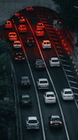 a highway filled with lots of traffic at night