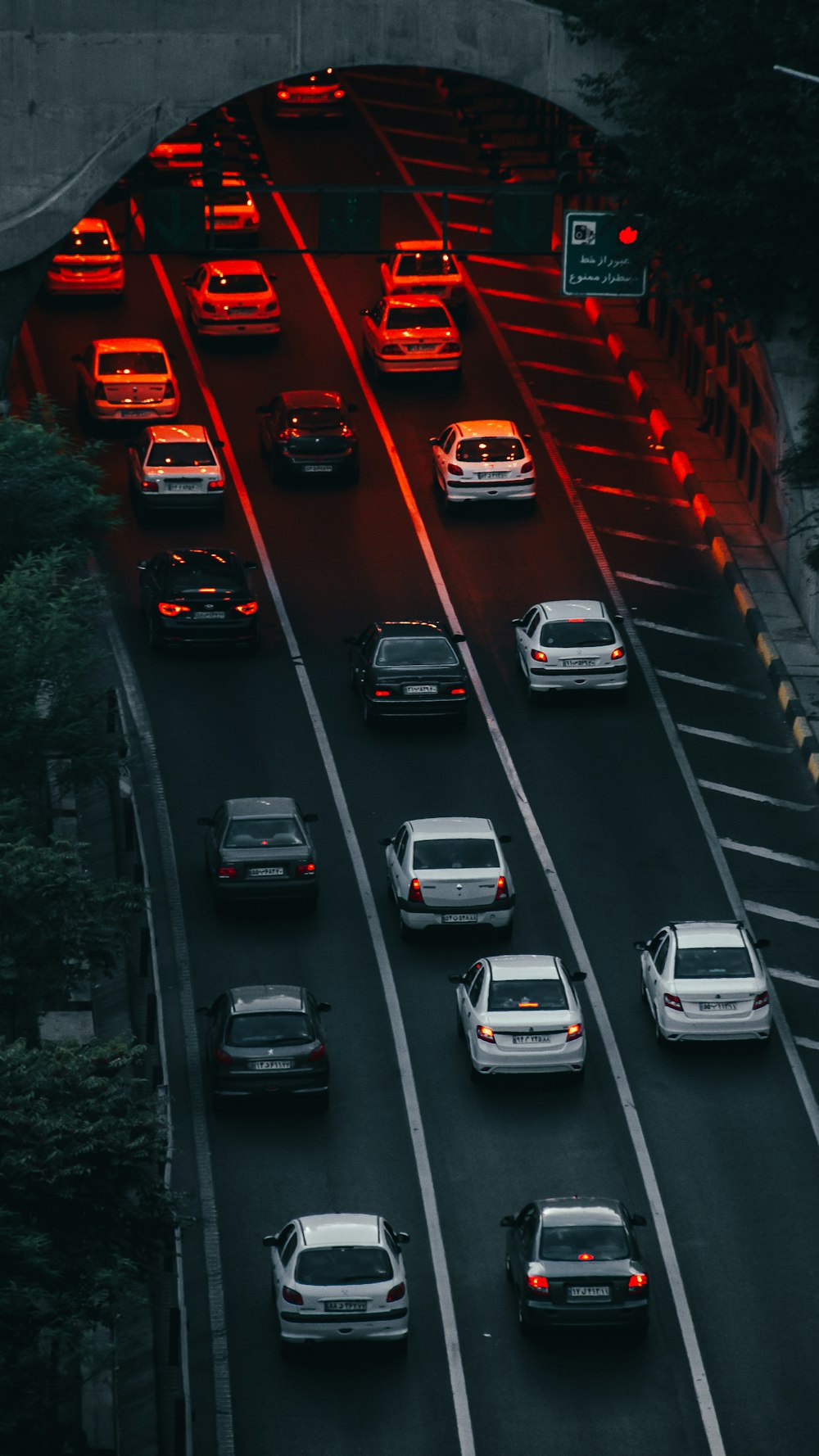 a highway filled with lots of traffic at night