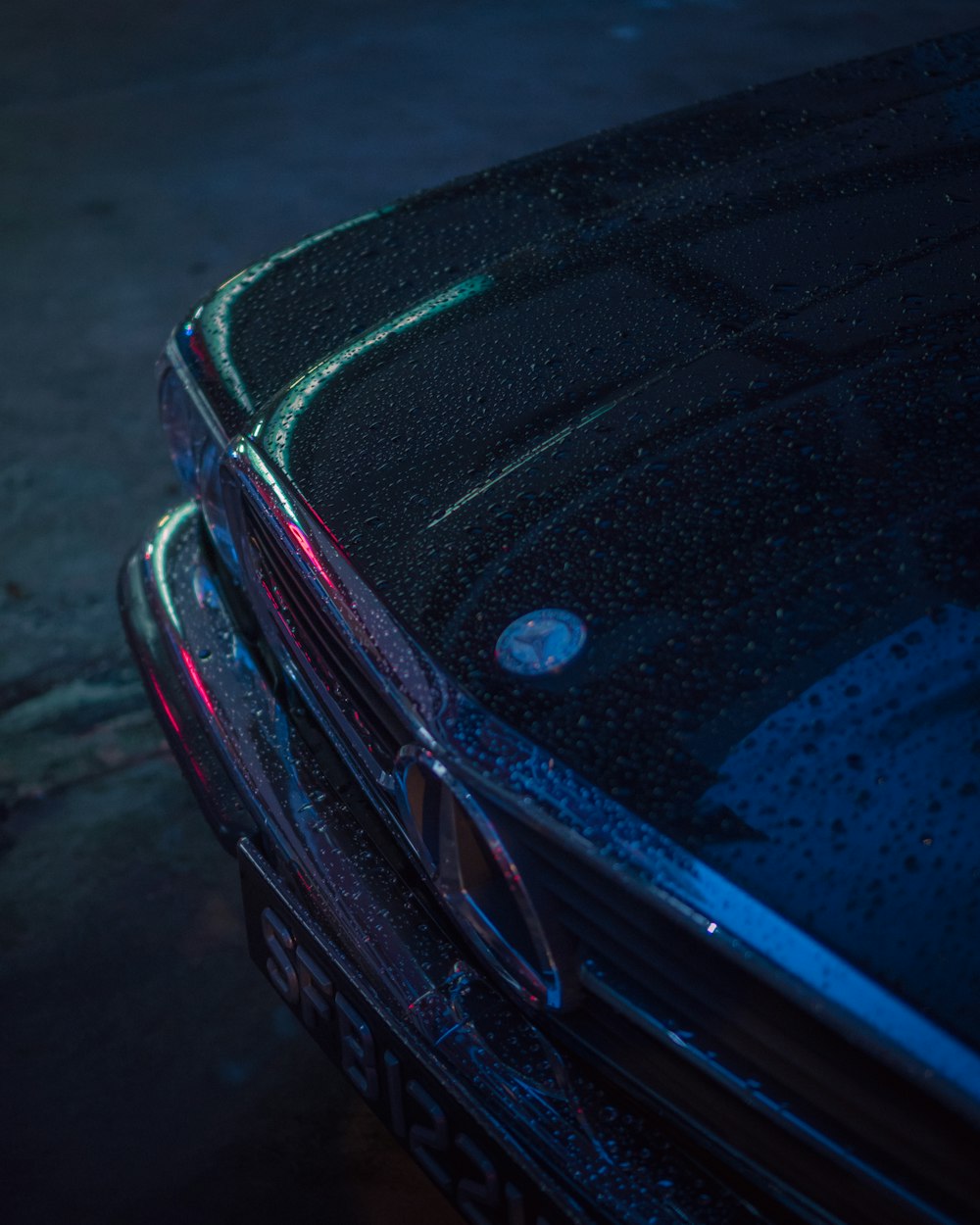 a close up of the hood of a car