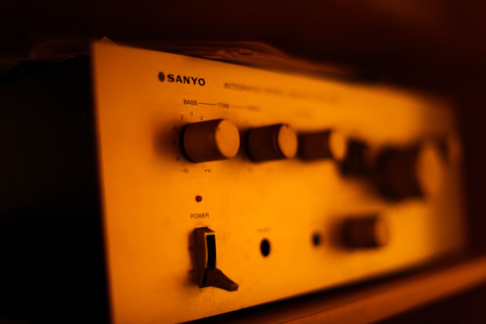 a close up of a radio on a shelf