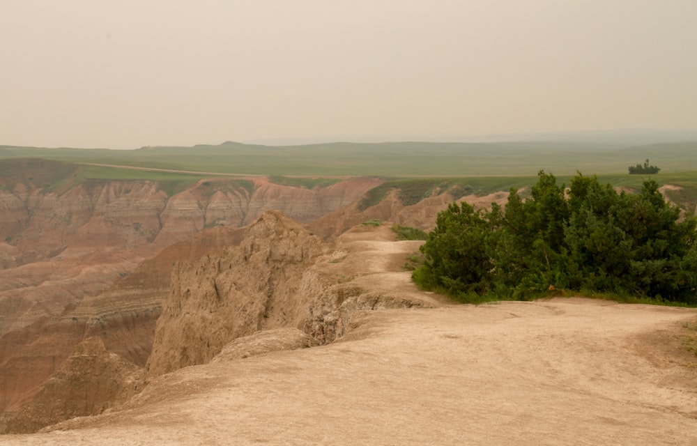 a view of a dirt road near a cliff