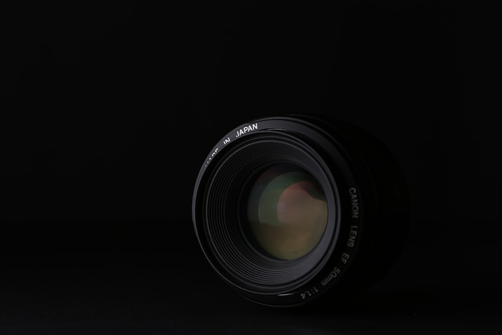 a camera lens on a black background