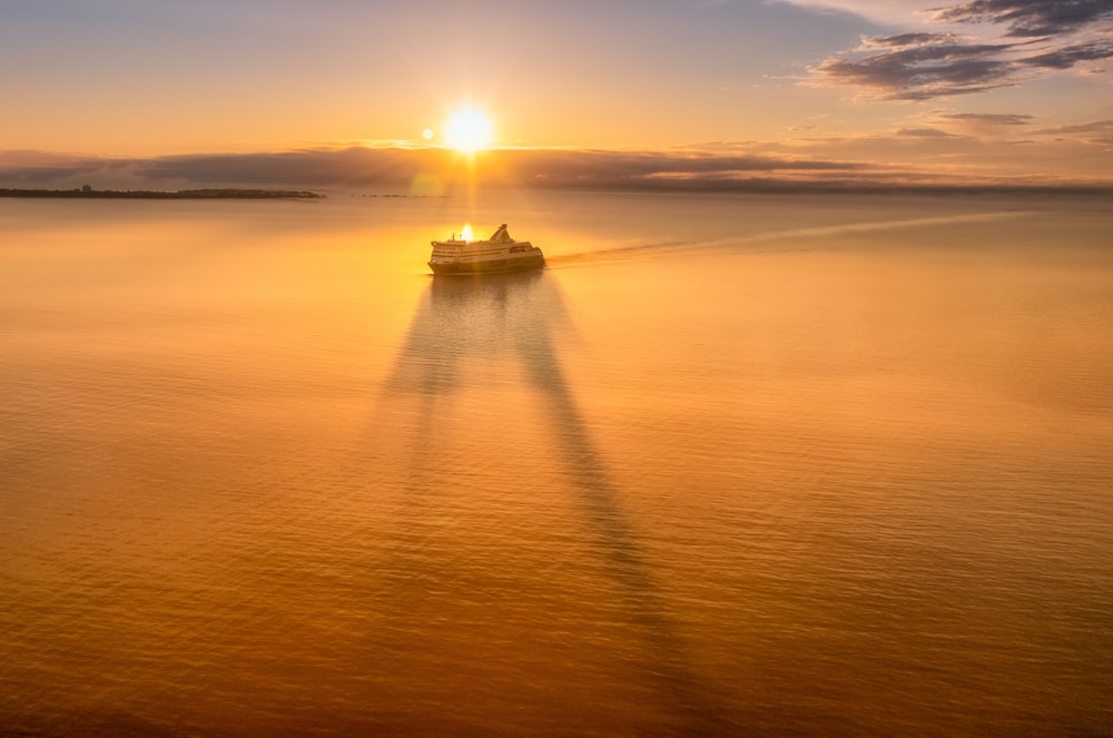 a cruise ship in the middle of a large body of water