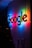 the google logo is lit up at night
