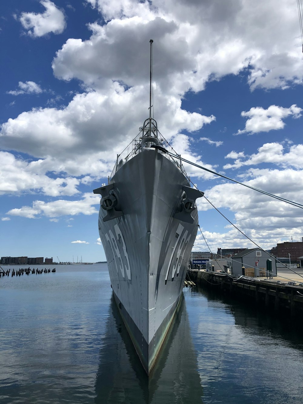 a large boat is docked in the water