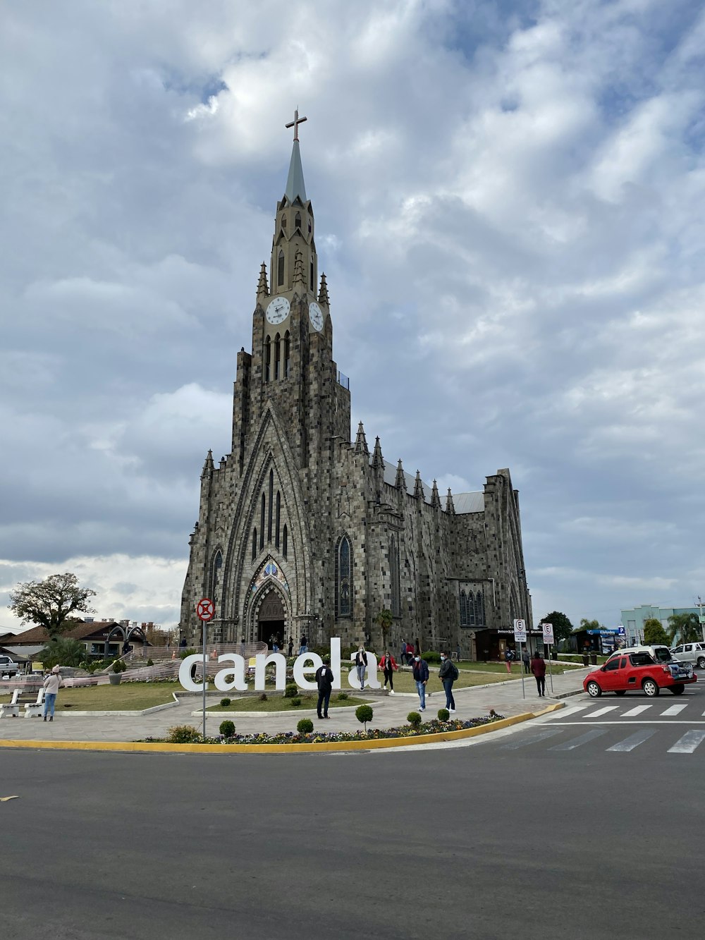 a large cathedral with a clock on the front of it