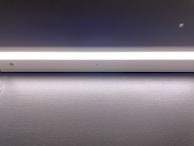 Under-cabinet LED strip lights brightening a kitchen countertop with clear, even light.