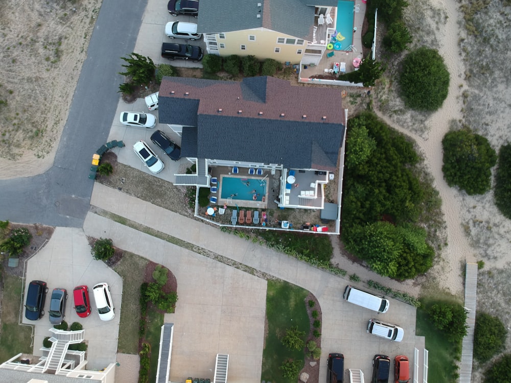 an aerial view of a house with a swimming pool