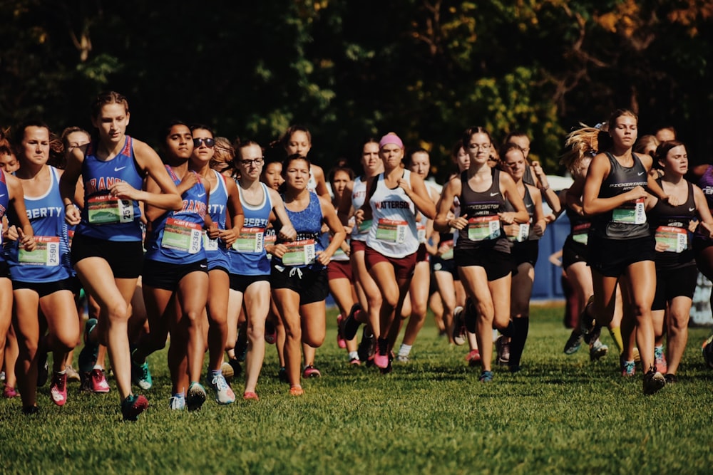 a group of people running in a race