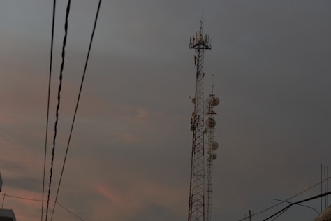 a tower with several cell phones on top of it