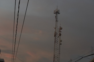 a tower with several cell phones on top of it