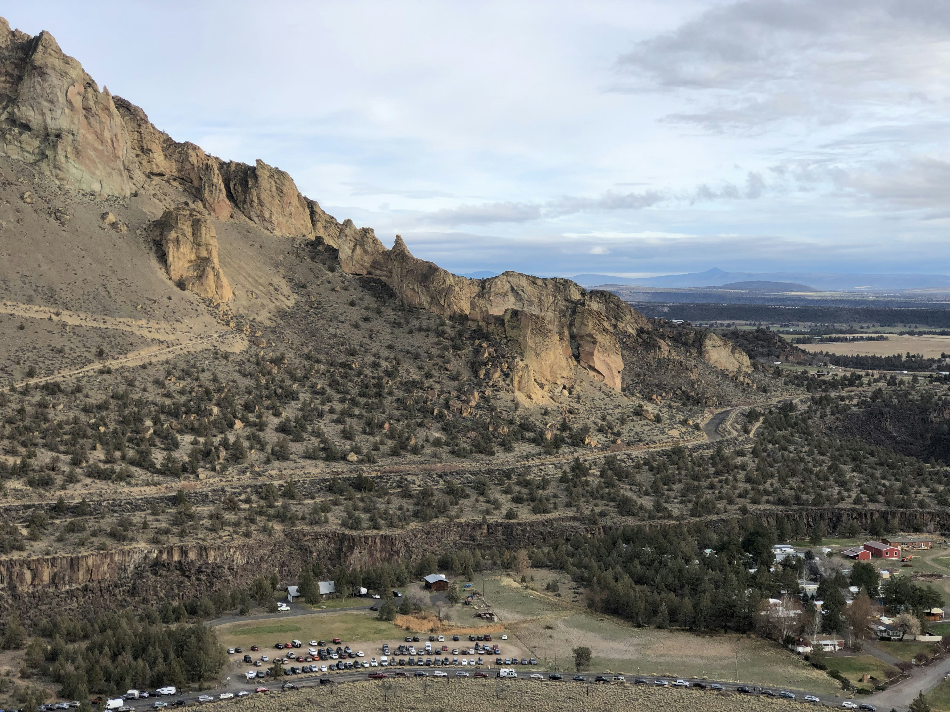 an aerial view of a small town in the mountains