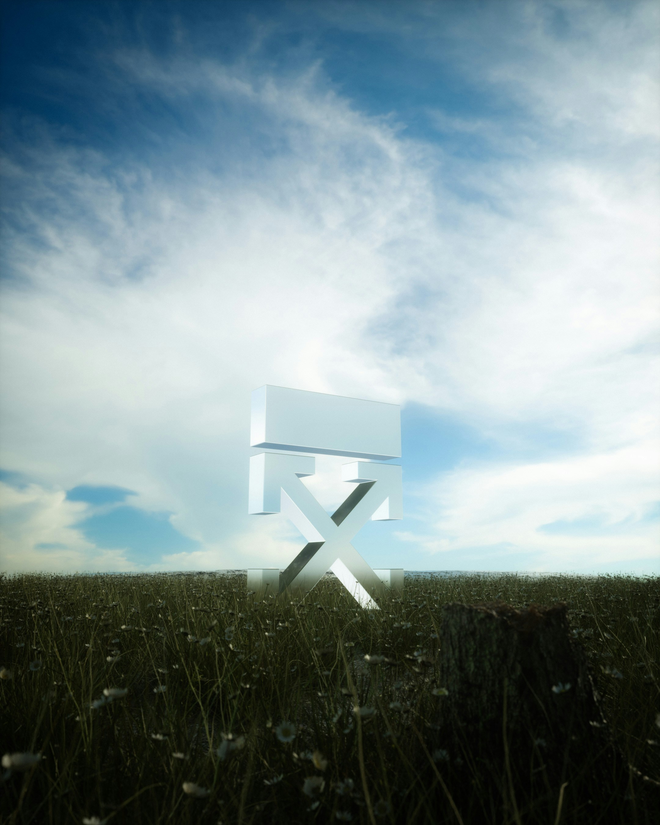 A white chair sitting in the middle of a field