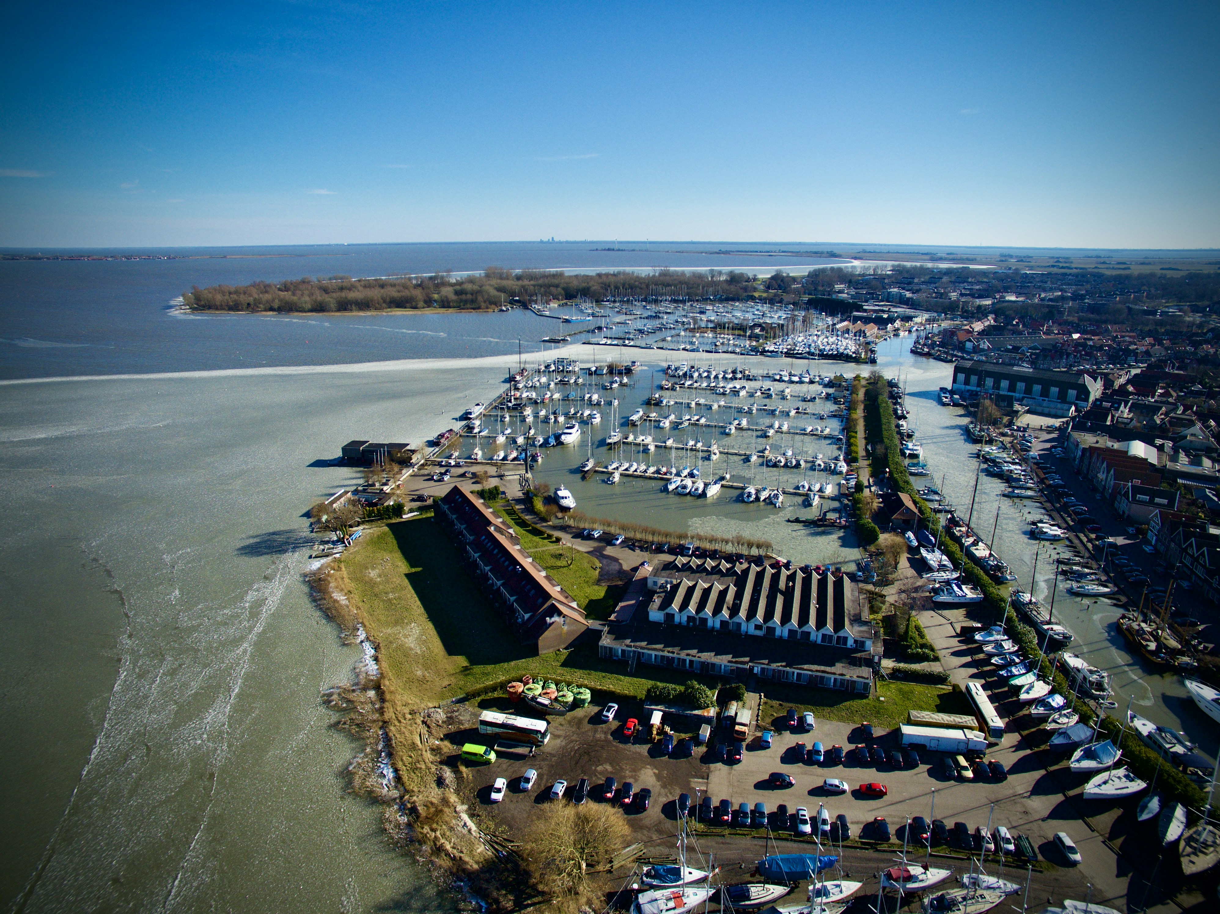 An aerial view of a marina with many boats photo – Free Winter Image on ...