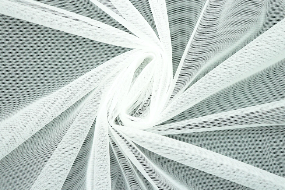 Close-up of the Just Bee duality activewear set in white, highlighting fabric texture and sleek design.