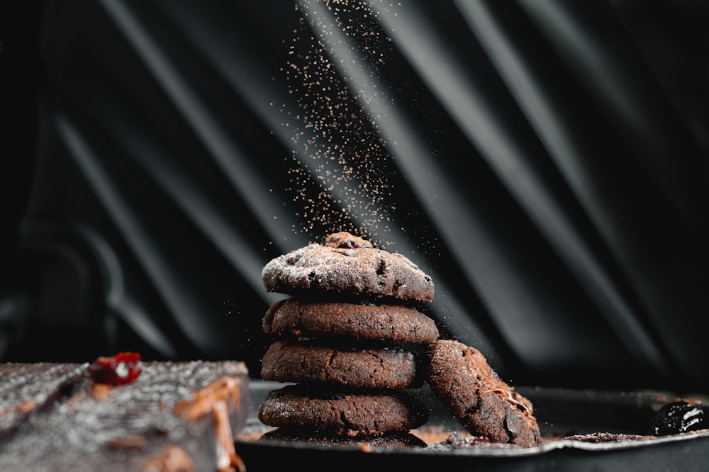 a pile of cookies sitting on top of a pan