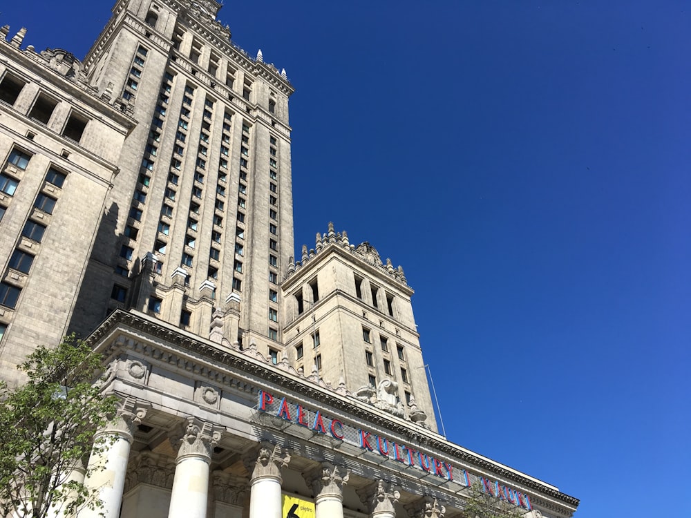 a very tall building with a very tall clock tower