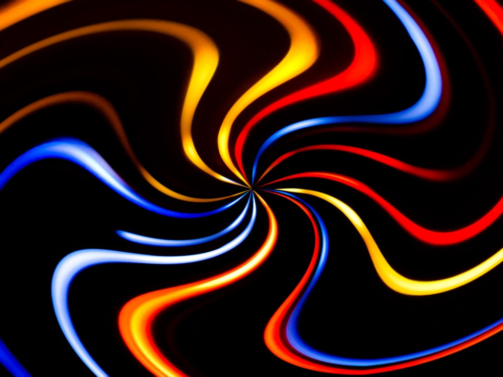 a colorful swirl of light on a black background