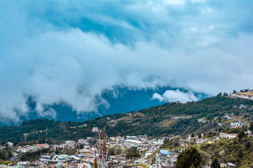 a view of a city with a mountain in the background