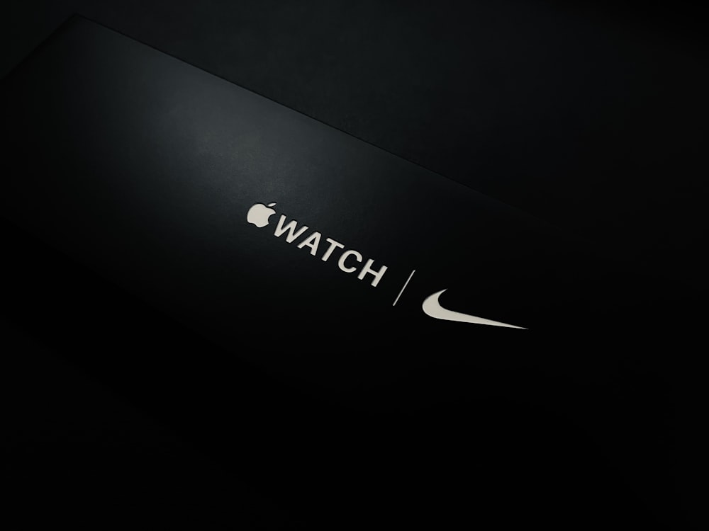the apple logo is displayed on a black background